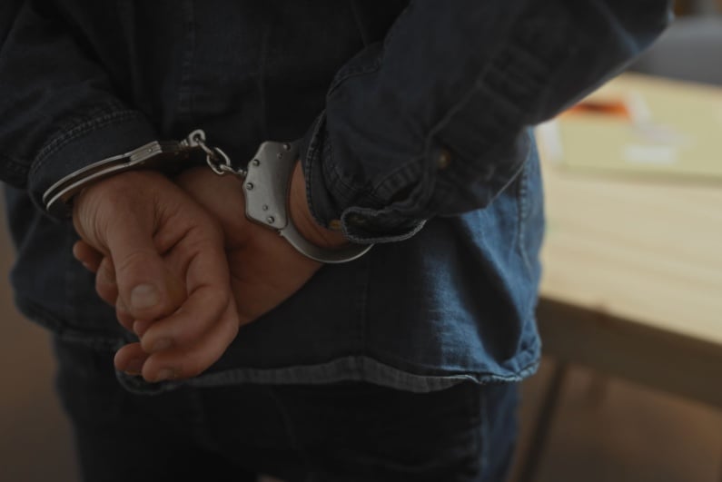 Man in cuffs
