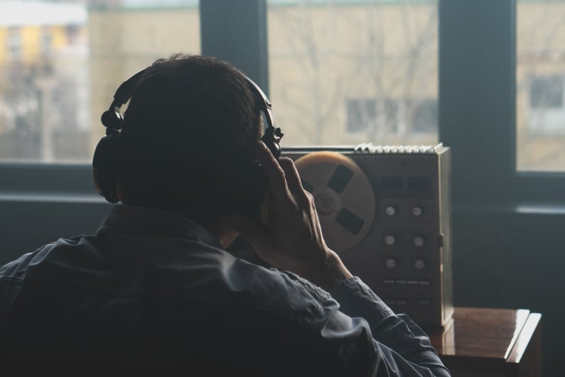 Man listening to recording