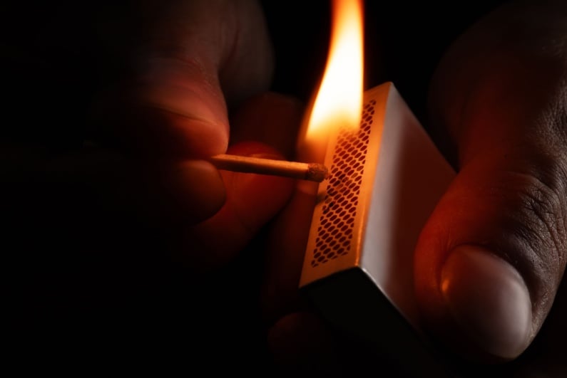 Lighting a match