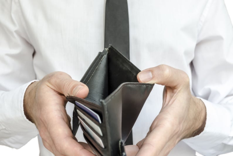 Businessman with empty wallet