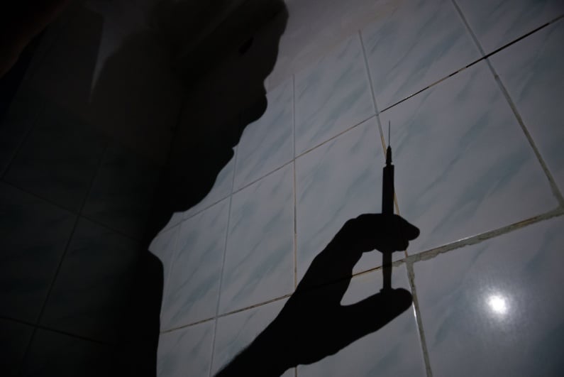Doctor with syringe