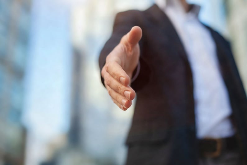Person shaking hand