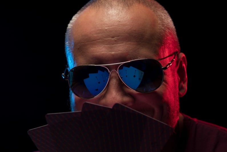 Poker player in sunglasses