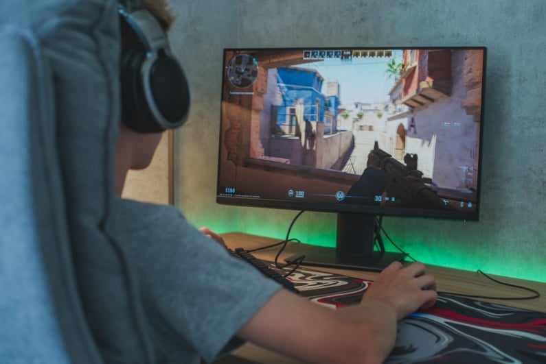 Boy playing Counter-Strike 2