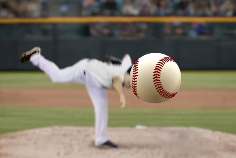 Man throwing baseball