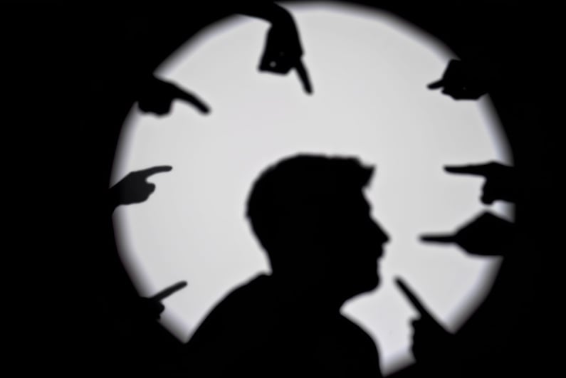 Man being pointed at