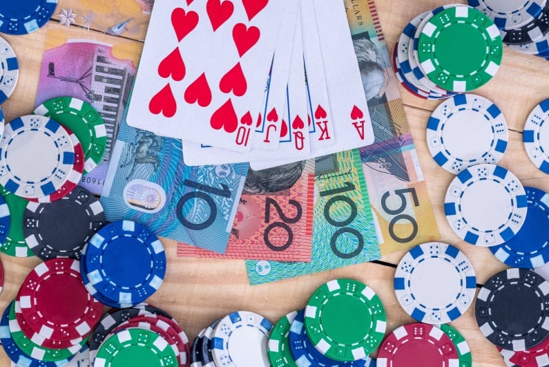 Playing cards and chips with Australian banknotes