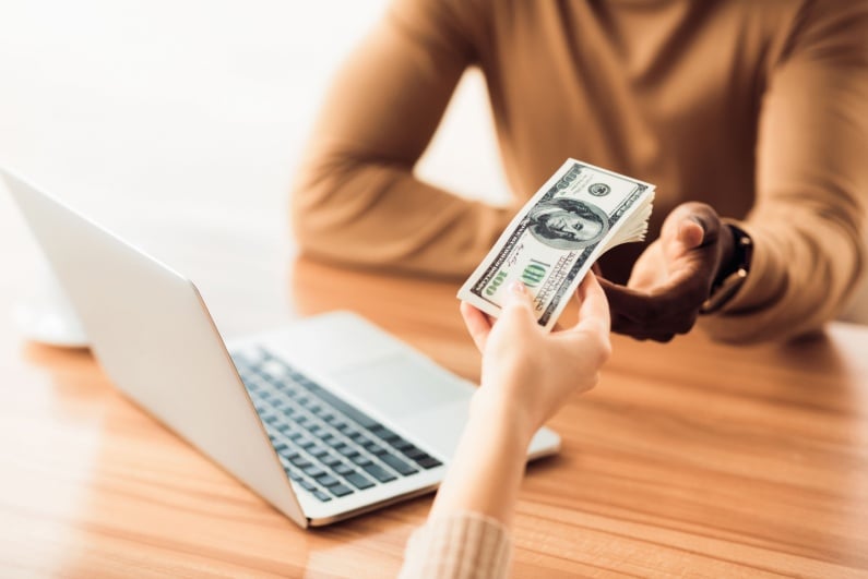 Person handing over money