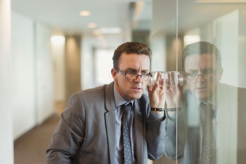 Businessman eavesdropping