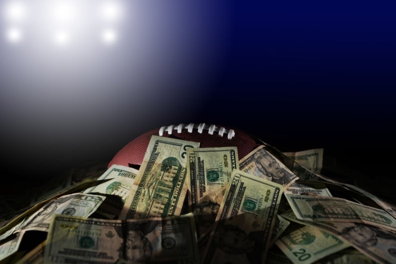 Football covered in cash