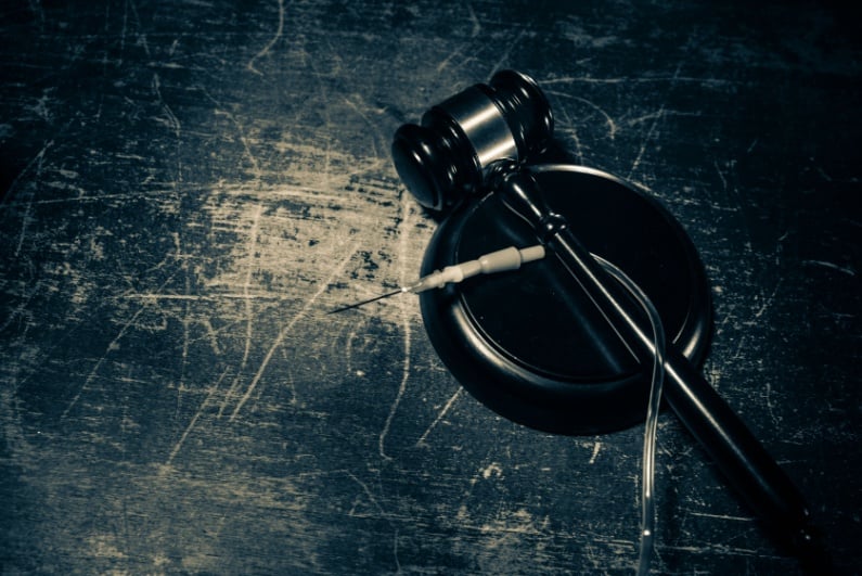 Judge gavel and syringe