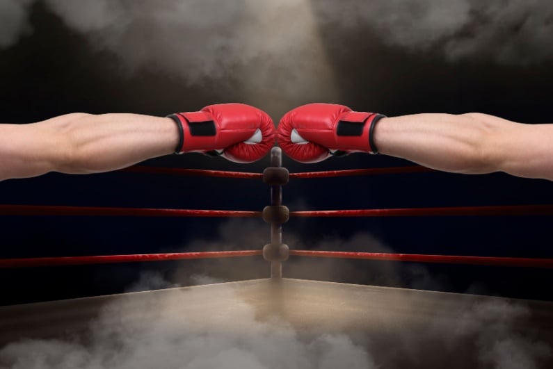 Boxers bumping gloves