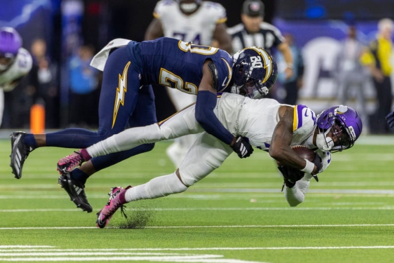 Jordan Addison getting tackled