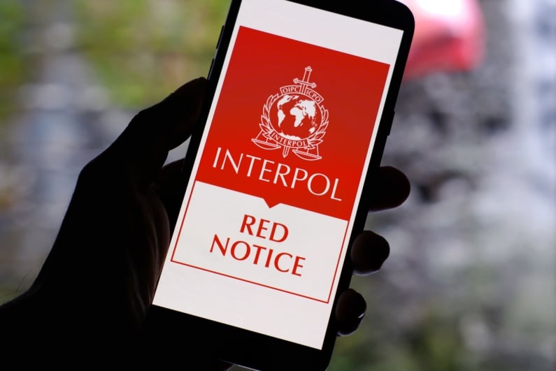 Interpol red notice on phone