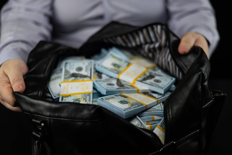 Black bag full of cash