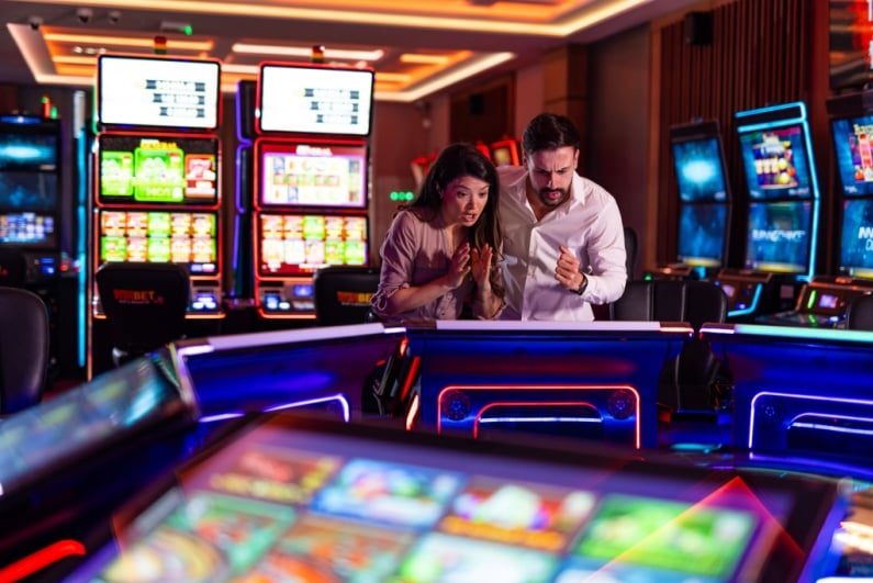 Couple anticipating big slot win