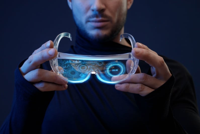 Man trying on futuristic goggles