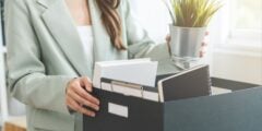 Person with box in office
